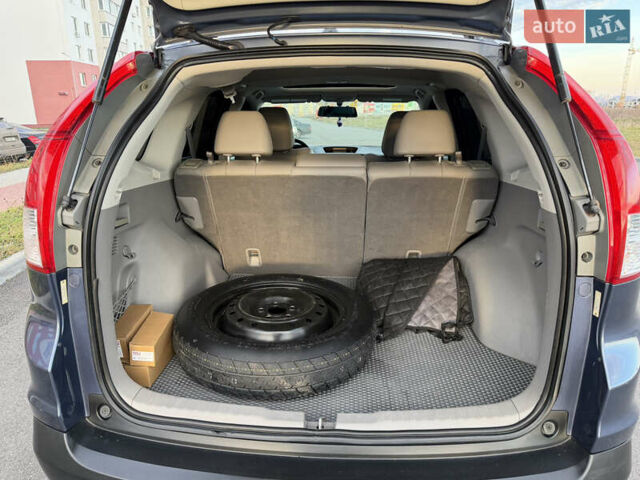 Синий Хонда СРВ, объемом двигателя 2.4 л и пробегом 250 тыс. км за 12777 $, фото 77 на Automoto.ua