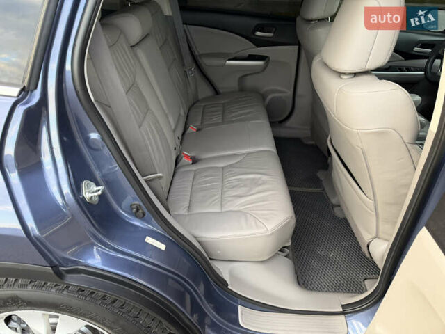 Синий Хонда СРВ, объемом двигателя 2.4 л и пробегом 250 тыс. км за 12777 $, фото 86 на Automoto.ua