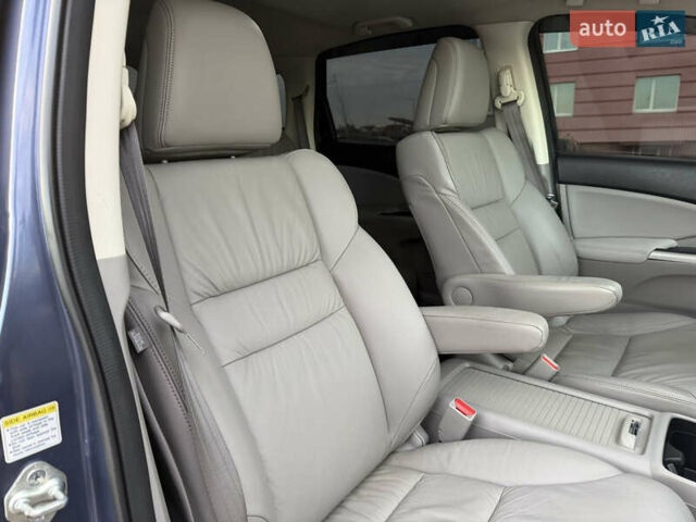 Синий Хонда СРВ, объемом двигателя 2.4 л и пробегом 250 тыс. км за 12777 $, фото 93 на Automoto.ua