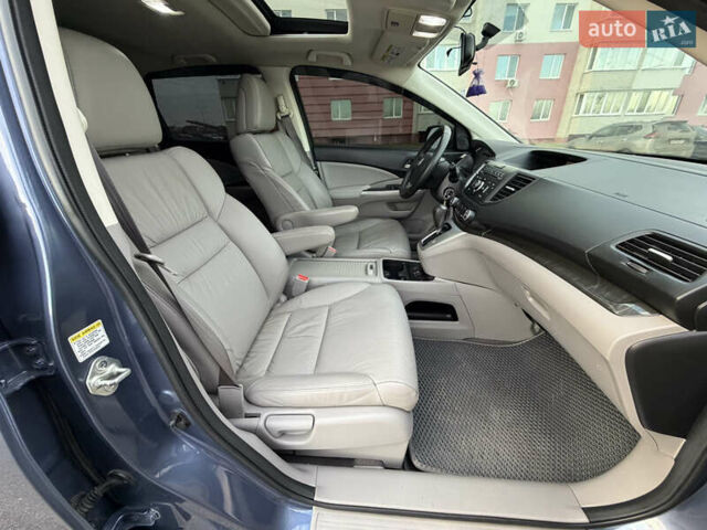 Синий Хонда СРВ, объемом двигателя 2.4 л и пробегом 250 тыс. км за 12777 $, фото 65 на Automoto.ua