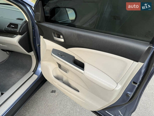 Синий Хонда СРВ, объемом двигателя 2.4 л и пробегом 250 тыс. км за 12777 $, фото 90 на Automoto.ua