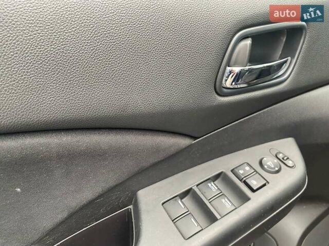 Синий Хонда СРВ, объемом двигателя 1.6 л и пробегом 169 тыс. км за 13850 $, фото 19 на Automoto.ua