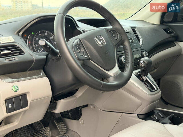 Синий Хонда СРВ, объемом двигателя 2.4 л и пробегом 250 тыс. км за 12777 $, фото 44 на Automoto.ua