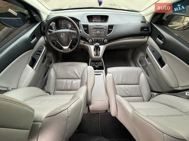 Синий Хонда СРВ, объемом двигателя 2.4 л и пробегом 250 тыс. км за 12777 $, фото 73 на Automoto.ua