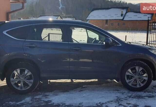 Синий Хонда СРВ, объемом двигателя 2.2 л и пробегом 320 тыс. км за 18313 $, фото 1 на Automoto.ua