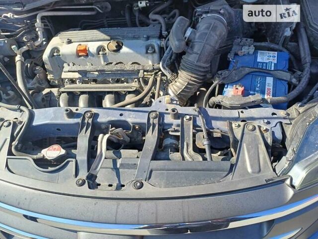 Синий Хонда СРВ, объемом двигателя 2.35 л и пробегом 207 тыс. км за 13900 $, фото 17 на Automoto.ua