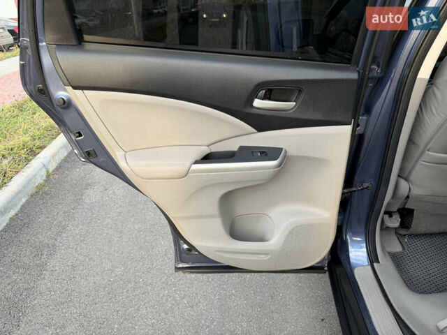 Синий Хонда СРВ, объемом двигателя 2.4 л и пробегом 250 тыс. км за 12777 $, фото 61 на Automoto.ua