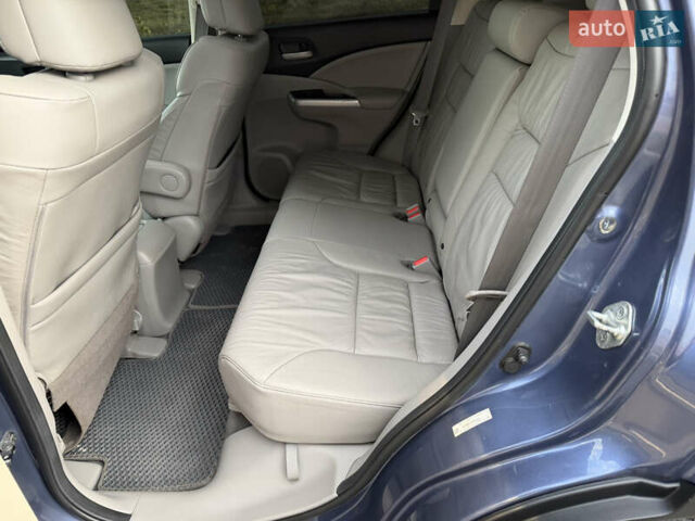 Синий Хонда СРВ, объемом двигателя 2.4 л и пробегом 250 тыс. км за 12777 $, фото 67 на Automoto.ua