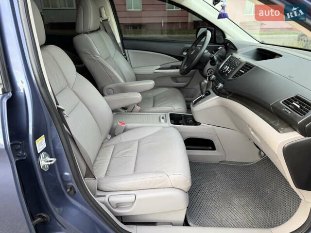 Синий Хонда СРВ, объемом двигателя 2.4 л и пробегом 250 тыс. км за 12777 $, фото 91 на Automoto.ua