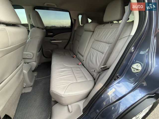 Синий Хонда СРВ, объемом двигателя 2.4 л и пробегом 250 тыс. км за 12777 $, фото 68 на Automoto.ua