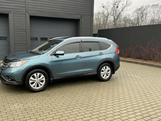 Синий Хонда СРВ, объемом двигателя 2.4 л и пробегом 270 тыс. км за 12900 $, фото 3 на Automoto.ua