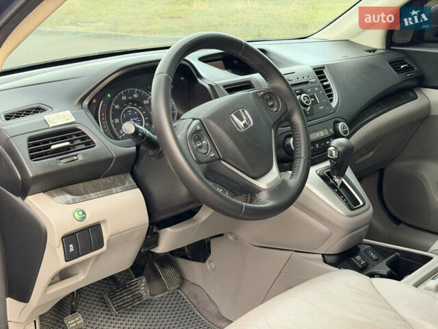 Синий Хонда СРВ, объемом двигателя 2.4 л и пробегом 250 тыс. км за 12777 $, фото 43 на Automoto.ua