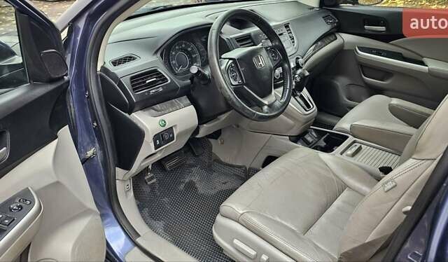 Хонда СРВ 2014 в Василькове на Automoto.ua Синий Хонда СРВ, объемом двигателя 2.35 л и пробегом 190 тыс. км за 15800 $, фото 15 на Automoto.ua