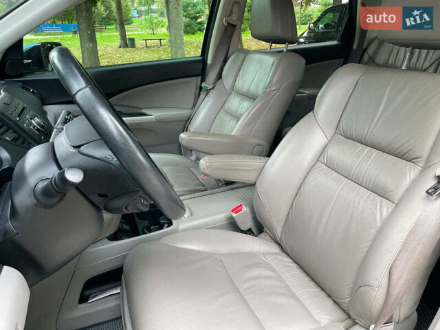 Хонда СРВ 2014 в Киеве на Automoto.ua Синий Хонда СРВ, объемом двигателя 2.4 л и пробегом 143 тыс. км за 16490 $, фото 19 на Automoto.ua