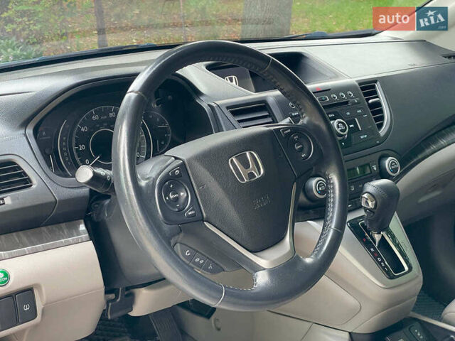 Хонда СРВ 2014 в Киеве на Automoto.ua Синий Хонда СРВ, объемом двигателя 2.4 л и пробегом 143 тыс. км за 16490 $, фото 17 на Automoto.ua