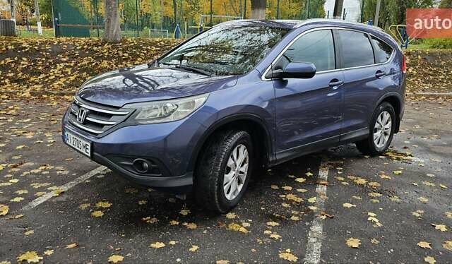 Хонда СРВ 2014 в Василькове на Automoto.ua Синий Хонда СРВ, объемом двигателя 2.35 л и пробегом 190 тыс. км за 15800 $, фото 11 на Automoto.ua