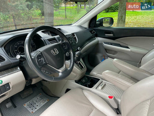 Хонда СРВ 2014 в Киеве на Automoto.ua Синий Хонда СРВ, объемом двигателя 2.4 л и пробегом 143 тыс. км за 16490 $, фото 18 на Automoto.ua