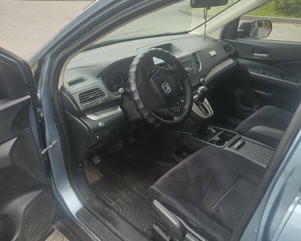 Синий Хонда СРВ, объемом двигателя 2.4 л и пробегом 120 тыс. км за 14000 $, фото 2 на Automoto.ua