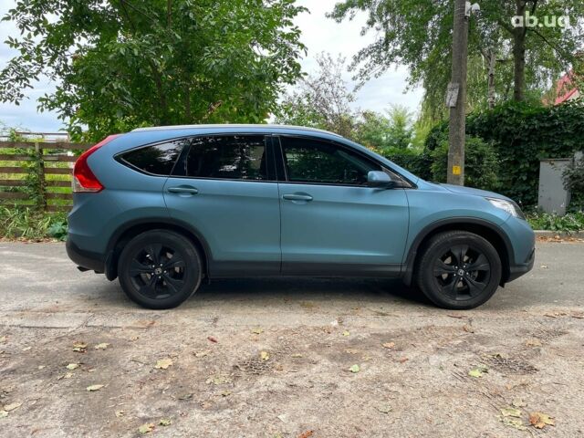 Синий Хонда СРВ, объемом двигателя 2.4 л и пробегом 143 тыс. км за 16490 $, фото 5 на Automoto.ua