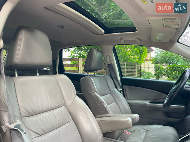 Хонда СРВ 2014 в Киеве на Automoto.ua Синий Хонда СРВ, объемом двигателя 2.4 л и пробегом 143 тыс. км за 16490 $, фото 33 на Automoto.ua