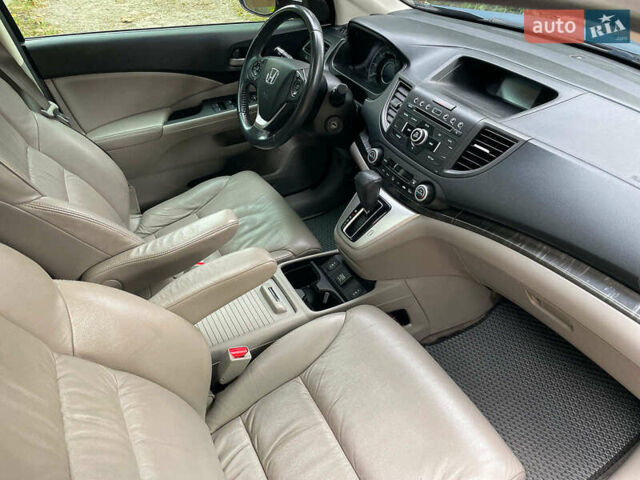 Хонда СРВ 2014 в Киеве на Automoto.ua Синий Хонда СРВ, объемом двигателя 2.4 л и пробегом 143 тыс. км за 16490 $, фото 34 на Automoto.ua