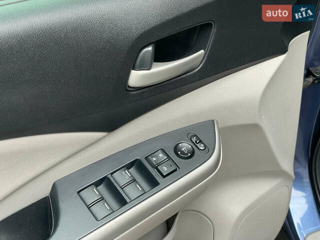 Хонда СРВ 2014 в Киеве на Automoto.ua Синий Хонда СРВ, объемом двигателя 2.4 л и пробегом 143 тыс. км за 16490 $, фото 23 на Automoto.ua