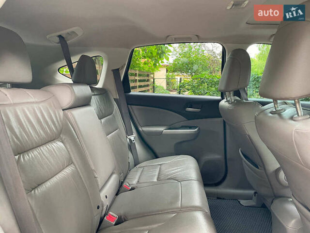 Хонда СРВ 2014 в Киеве на Automoto.ua Синий Хонда СРВ, объемом двигателя 2.4 л и пробегом 143 тыс. км за 16490 $, фото 30 на Automoto.ua