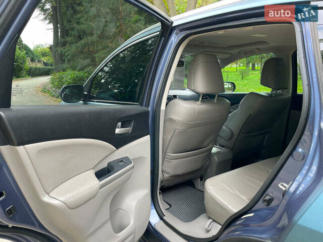 Хонда СРВ 2014 в Киеве на Automoto.ua Синий Хонда СРВ, объемом двигателя 2.4 л и пробегом 143 тыс. км за 16490 $, фото 16 на Automoto.ua