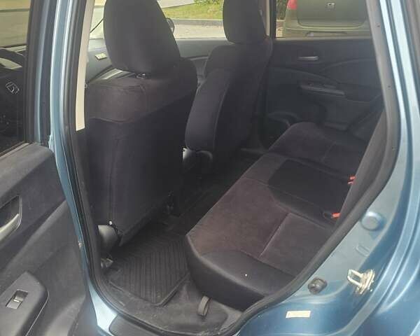 Синий Хонда СРВ, объемом двигателя 2.4 л и пробегом 120 тыс. км за 14000 $, фото 1 на Automoto.ua