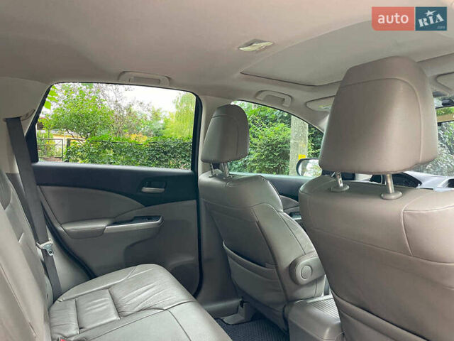 Хонда СРВ 2014 в Киеве на Automoto.ua Синий Хонда СРВ, объемом двигателя 2.4 л и пробегом 143 тыс. км за 16490 $, фото 31 на Automoto.ua