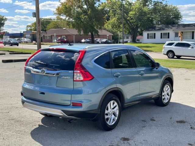 Синий Хонда СРВ, объемом двигателя 2.4 л и пробегом 77 тыс. км за 9800 $, фото 4 на Automoto.ua