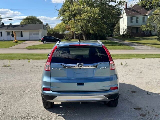 Синий Хонда СРВ, объемом двигателя 2.4 л и пробегом 77 тыс. км за 9800 $, фото 5 на Automoto.ua