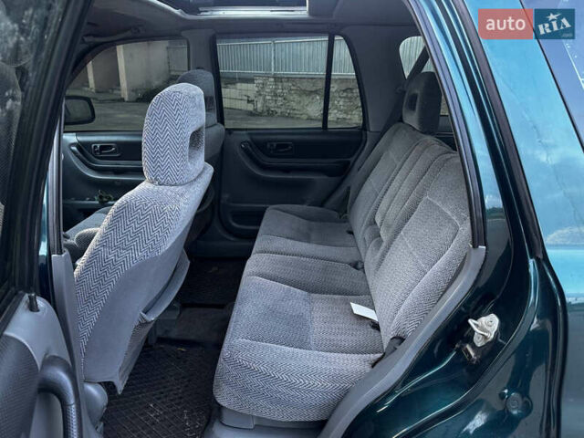 Зелений Хонда СРВ, об'ємом двигуна 2 л та пробігом 368 тис. км за 4000 $, фото 23 на Automoto.ua