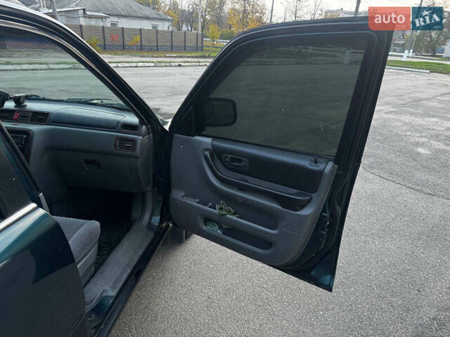 Зелений Хонда СРВ, об'ємом двигуна 2 л та пробігом 368 тис. км за 4000 $, фото 28 на Automoto.ua