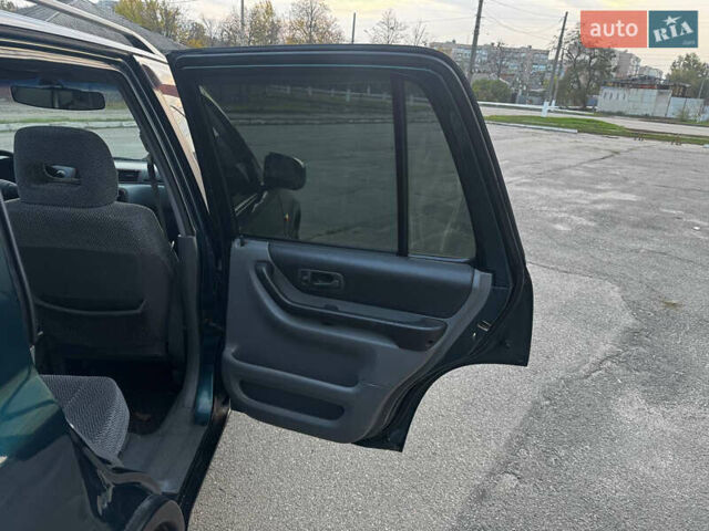 Зелений Хонда СРВ, об'ємом двигуна 2 л та пробігом 368 тис. км за 4000 $, фото 26 на Automoto.ua