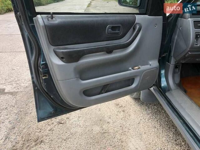 Зелений Хонда СРВ, об'ємом двигуна 2 л та пробігом 220 тис. км за 3850 $, фото 37 на Automoto.ua