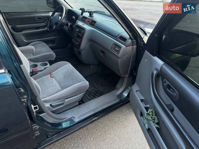 Зелений Хонда СРВ, об'ємом двигуна 2 л та пробігом 368 тис. км за 4000 $, фото 29 на Automoto.ua