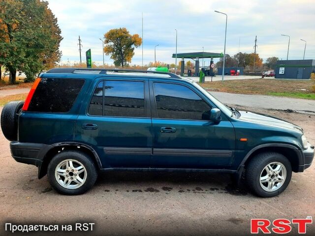 Зеленый Хонда СРВ, объемом двигателя 2 л и пробегом 240 тыс. км за 5800 $, фото 5 на Automoto.ua