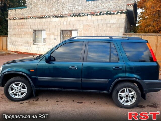 Зеленый Хонда СРВ, объемом двигателя 2 л и пробегом 240 тыс. км за 5800 $, фото 3 на Automoto.ua