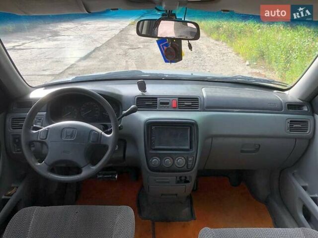 Зелений Хонда СРВ, об'ємом двигуна 2 л та пробігом 220 тис. км за 3850 $, фото 49 на Automoto.ua