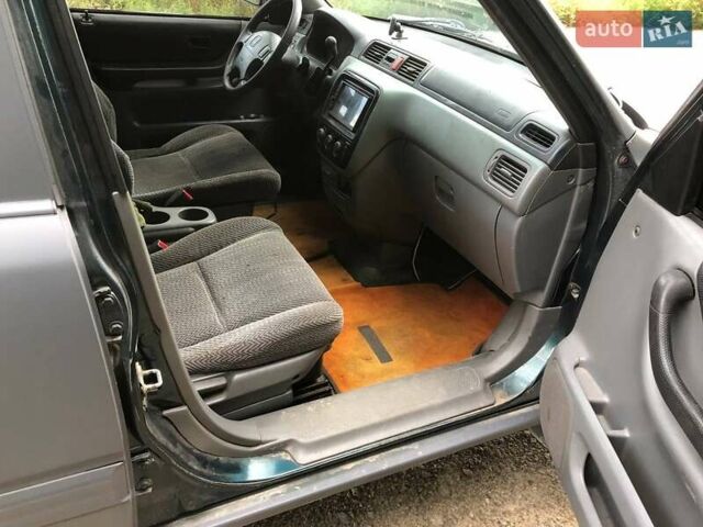 Зелений Хонда СРВ, об'ємом двигуна 2 л та пробігом 220 тис. км за 3850 $, фото 27 на Automoto.ua