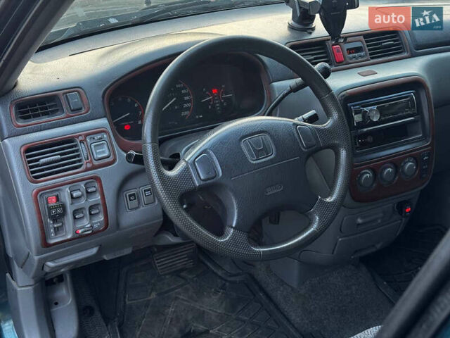 Зелений Хонда СРВ, об'ємом двигуна 2 л та пробігом 368 тис. км за 4000 $, фото 16 на Automoto.ua