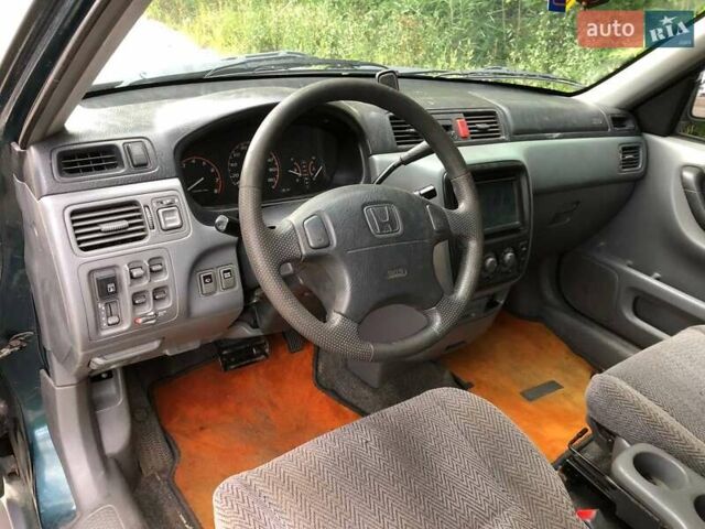 Зелений Хонда СРВ, об'ємом двигуна 2 л та пробігом 220 тис. км за 3850 $, фото 39 на Automoto.ua