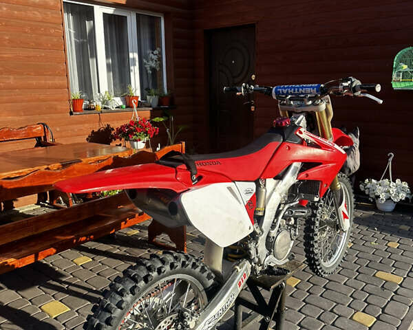 Красный Хонда CRF 250R, объемом двигателя 0.25 л и пробегом 2 тыс. км за 2350 $, фото 2 на Automoto.ua