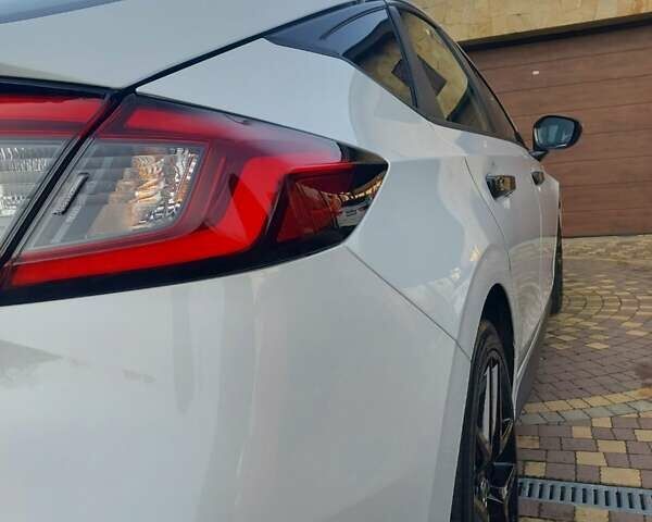 Белый Хонда Цивик, объемом двигателя 2 л и пробегом 7 тыс. км за 23500 $, фото 9 на Automoto.ua