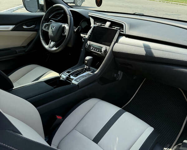 Белый Хонда Цивик, объемом двигателя 2 л и пробегом 173 тыс. км за 14500 $, фото 16 на Automoto.ua