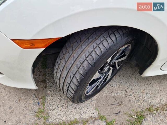 Белый Хонда Цивик, объемом двигателя 2 л и пробегом 70 тыс. км за 13500 $, фото 30 на Automoto.ua