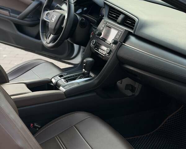 Белый Хонда Цивик, объемом двигателя 2 л и пробегом 186 тыс. км за 12500 $, фото 14 на Automoto.ua