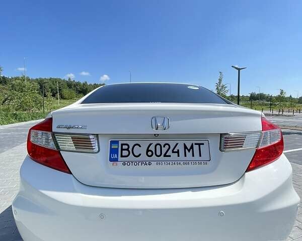 Белый Хонда Цивик, объемом двигателя 1.8 л и пробегом 127 тыс. км за 13500 $, фото 11 на Automoto.ua