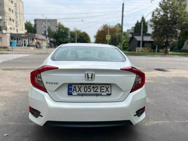 Белый Хонда Цивик, объемом двигателя 2 л и пробегом 95 тыс. км за 11800 $, фото 14 на Automoto.ua